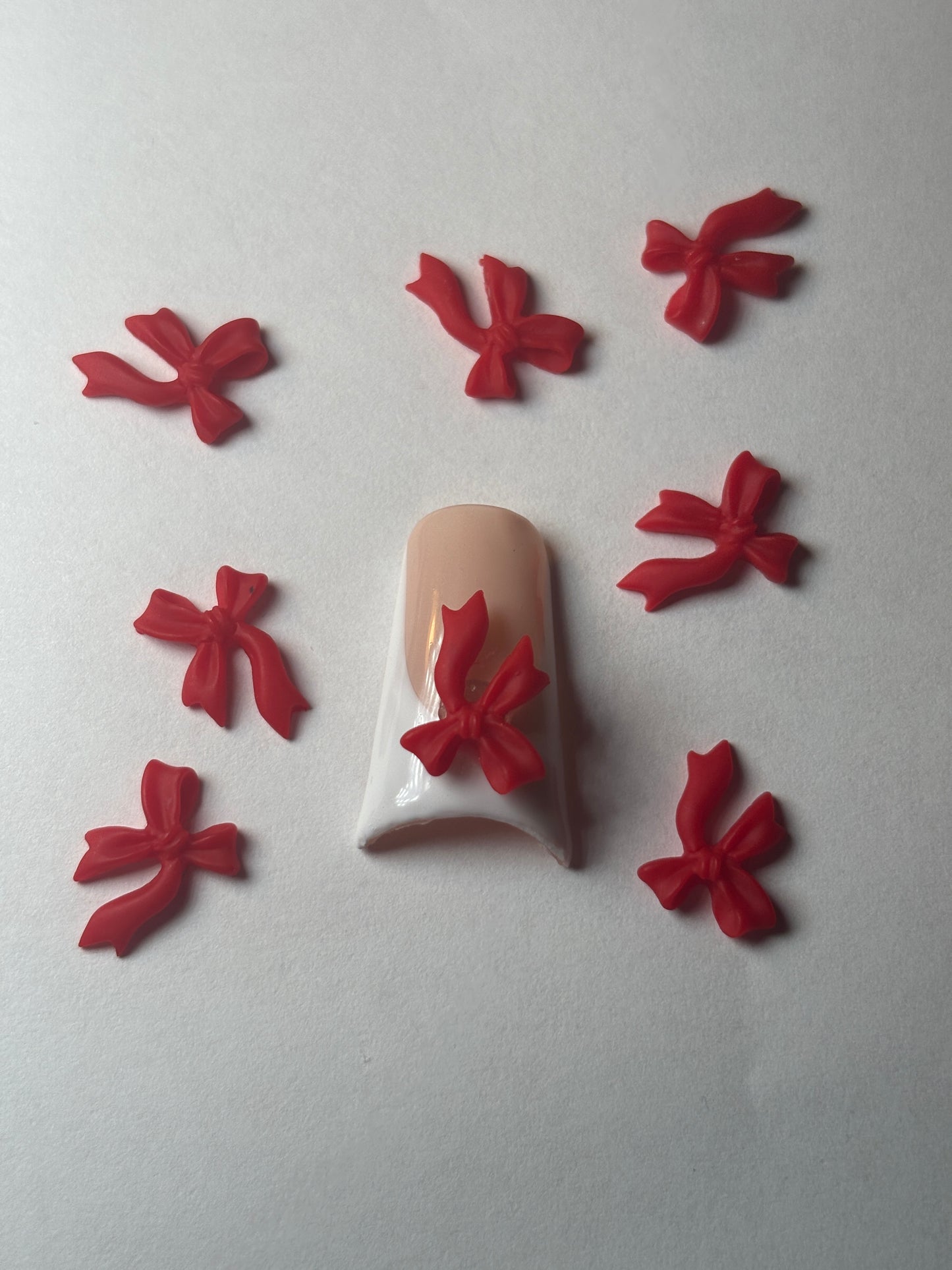 Slanted Red Bow Nail Charm