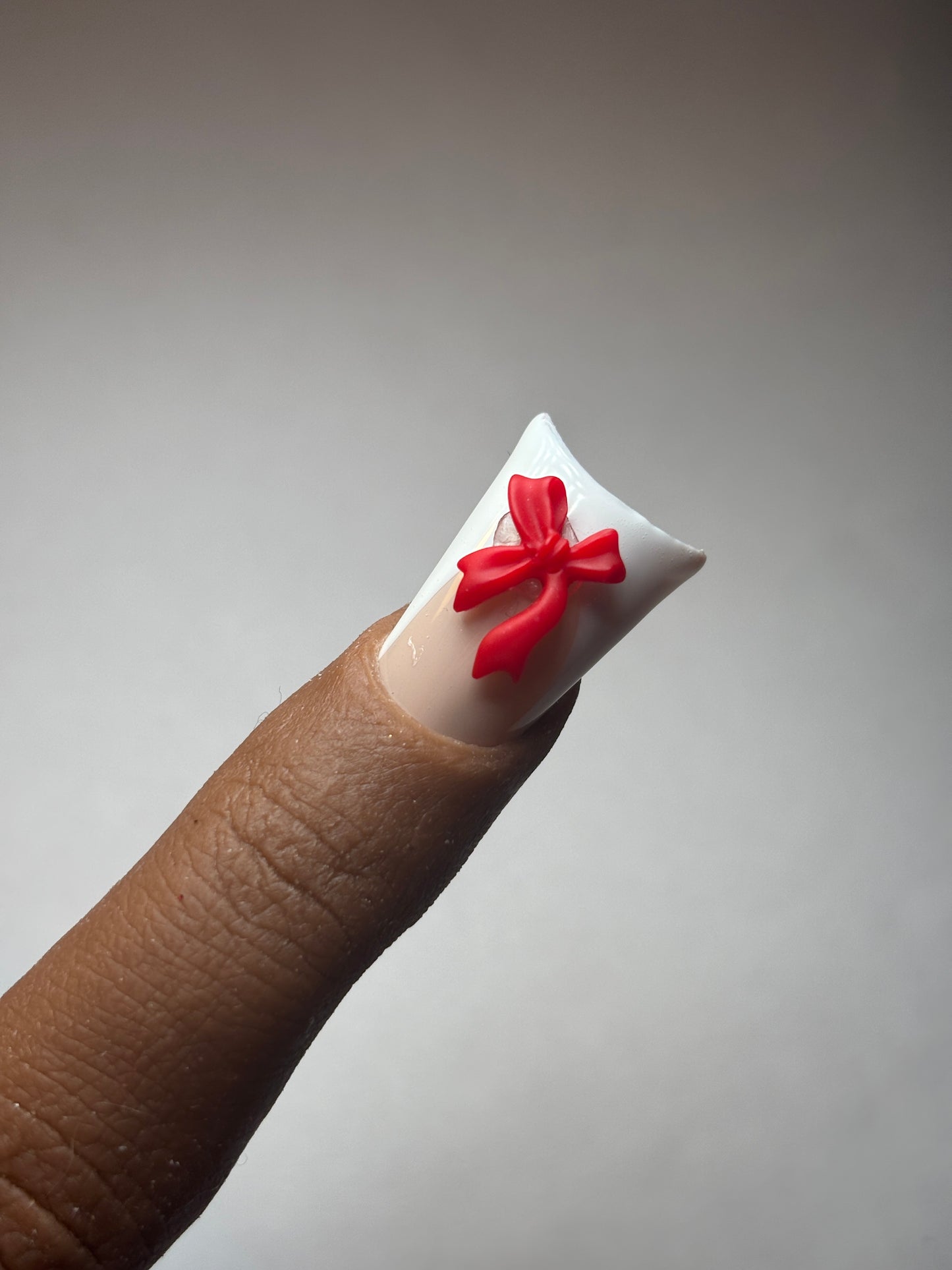 Slanted Red Bow Nail Charm