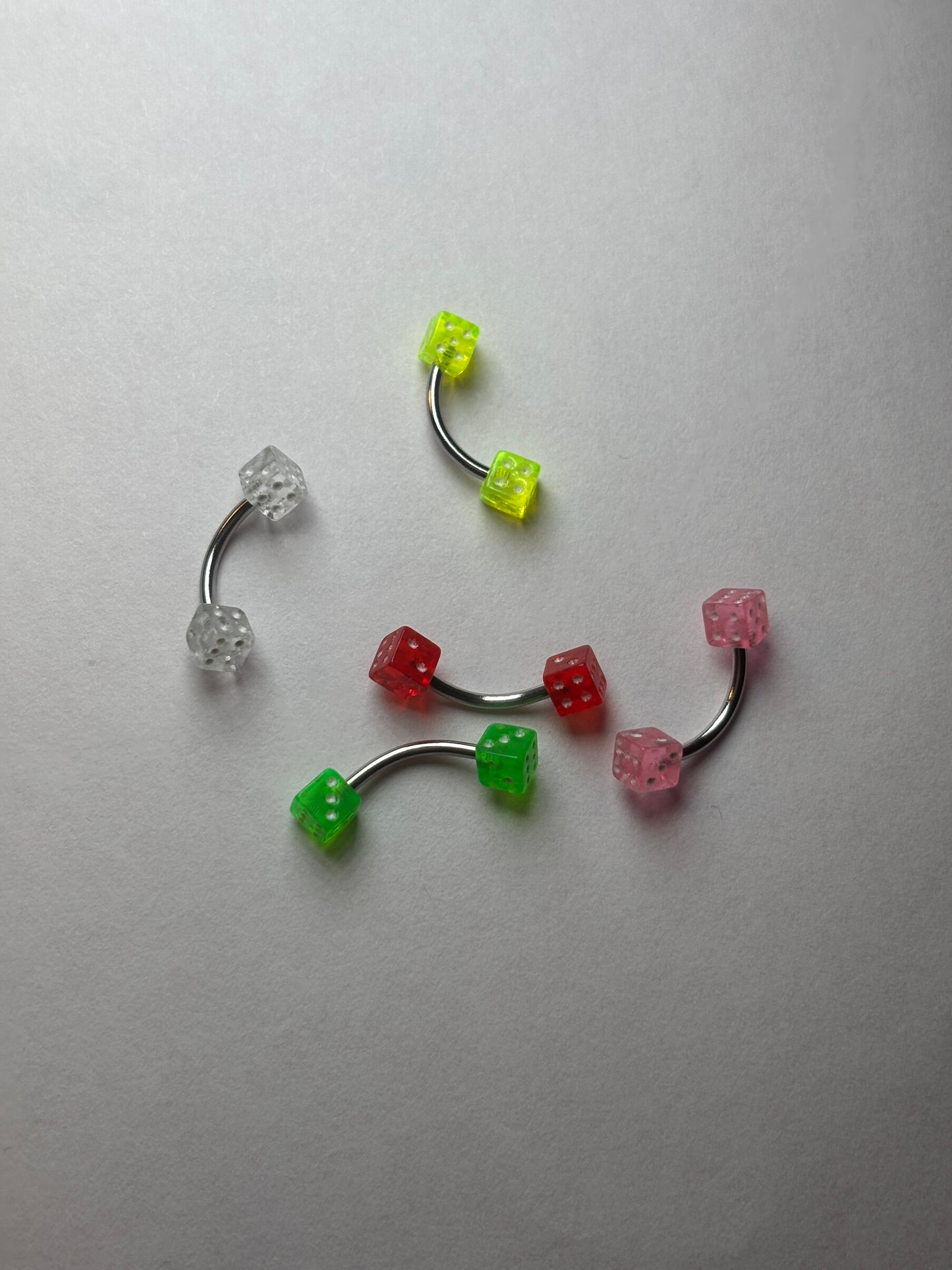 Short curved bar dice piercing