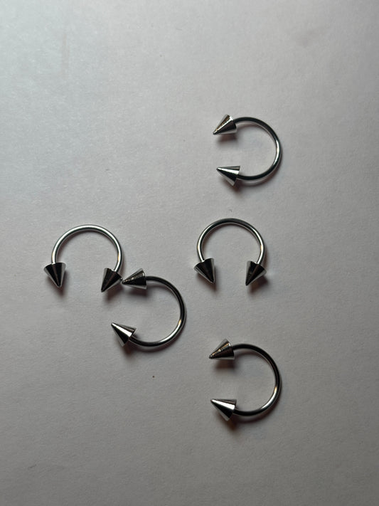 Large stainless steel, horseshoe pointed piercing