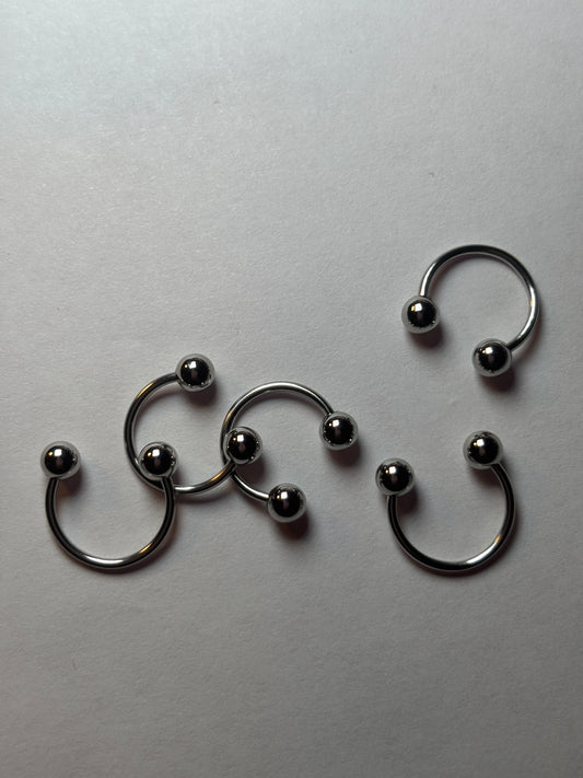 Large stainless steel, horseshoe piercing