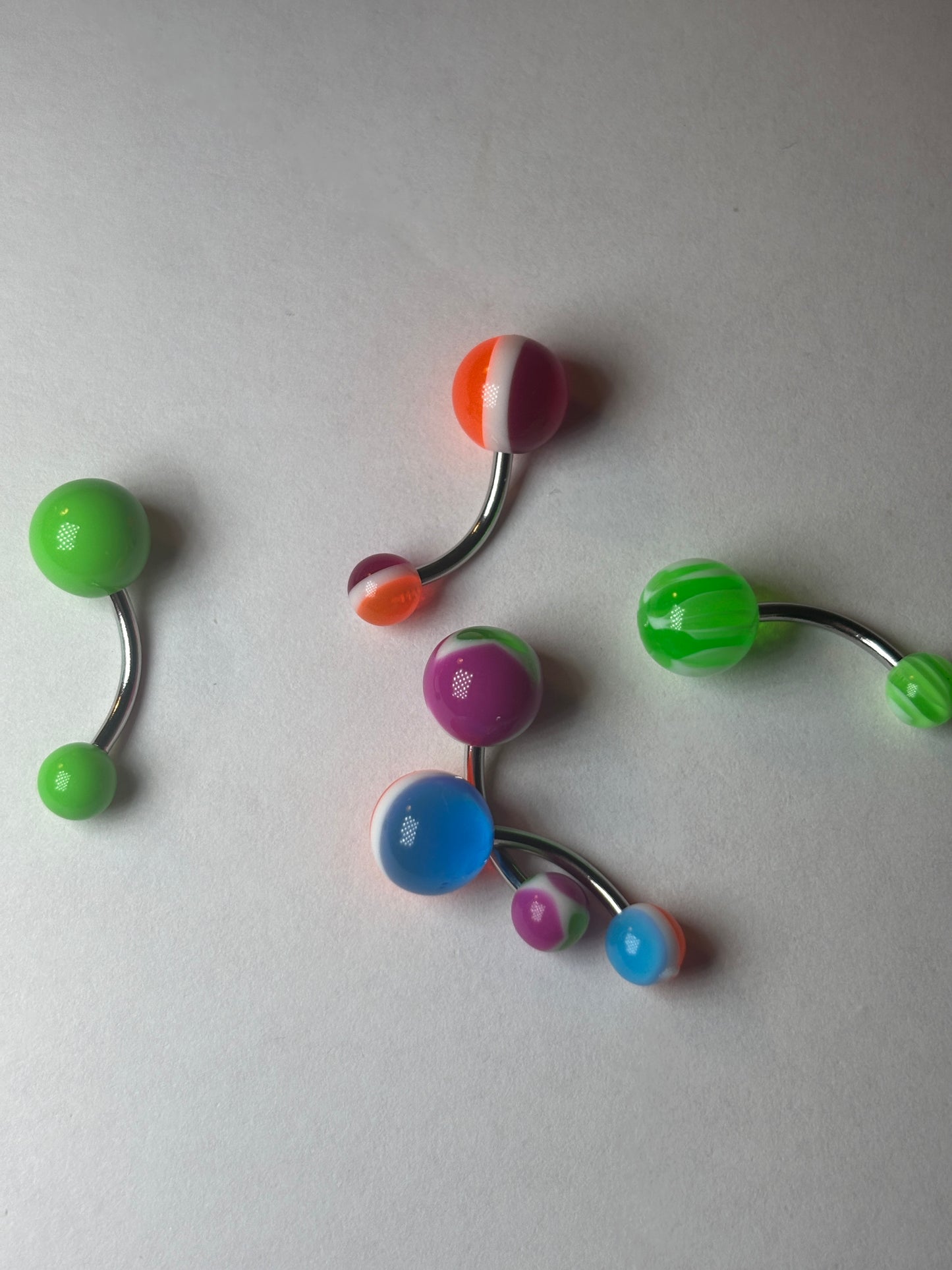 Large Small stainless marbled curved piercings