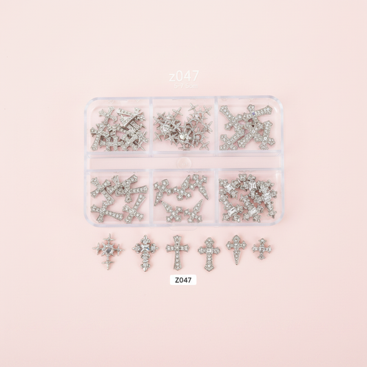 Silver Cross Nail Charms Light Pink Background